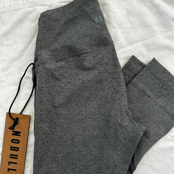 NOBULL High-Rise Plush Heather 21” Tight
Color: Heather Grey - Picture 2 of 3